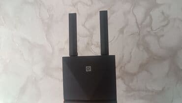 Wi‑Fi роутер с двумя внешними антеннами - Две мощные поворотные