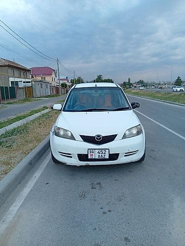 e2 byd: Mazda Demio: 2003 г., 1.3 л, Автомат, Бензин, Хэтчбэк — 2