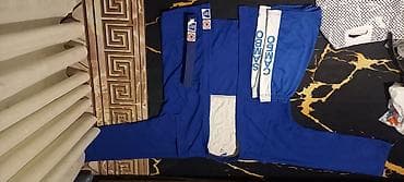 Комплект для самбо и борьбы. Состав набора: - Куртка самбистская