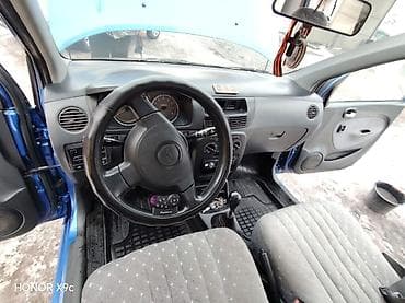 bmw 39: Daihatsu Cuore: 2003 г., Механика, Хэтчбэк — 8