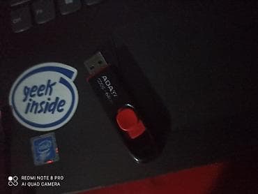 a 20: Флеш-накопитель ADATA C008, 64 ГБ. - Интерфейс USB (выдвижной разъём — 3