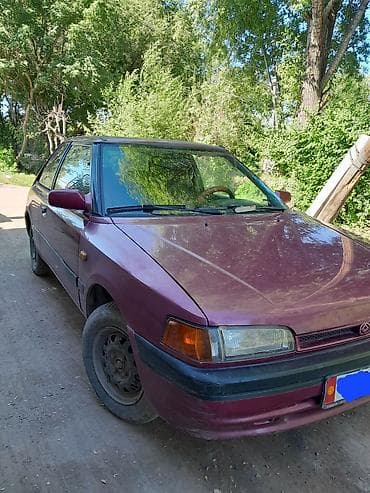 нужна: Mazda 323: 1994 г., 1.3 л, Механика, Бензин, Хэтчбэк — 2