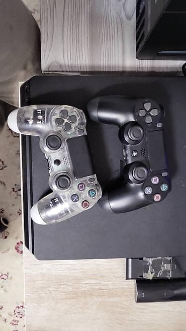 игры на playstation 2: Консоль PS4 Slim (чёрная) - 1терабайт • 2 контроллера DualShock 4 — 2