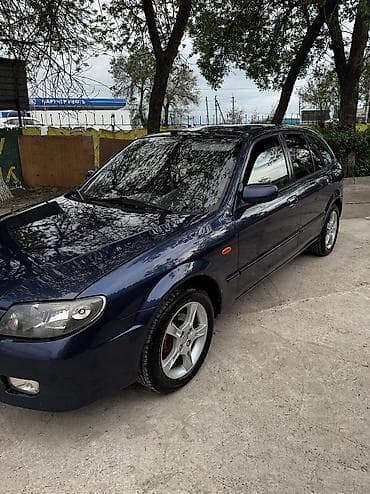 Mazda 323: 2002 г., 1.6 л, Ручные, Бензин, Универсал