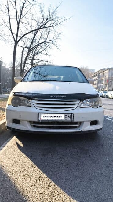 шипованные шины б у: Honda Odyssey: 2000 г., 2.3 л, Автомат, Бензиновая, Минивэн — 1