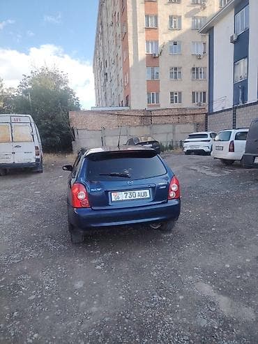 subaru forester 2001: Mazda 323: 2002 г., Механика, Хэтчбэк — 5