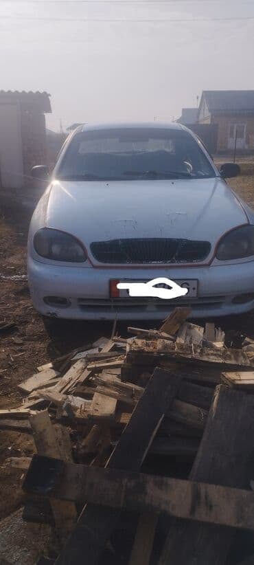 крыло нексия 1: Daewoo Lanos: 1996 г., Механика, Бензиновая, Седан — 1