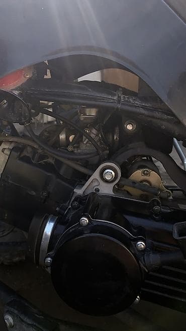 скутер 80: Квадроцикл утилитарного типа, черный. Особенности и комплектация: - — 7