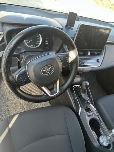 обмен на авто с доплатой: Toyota Corolla: 2019 г., 1.8 л, Вариатор, Гибрид, Седан — 9