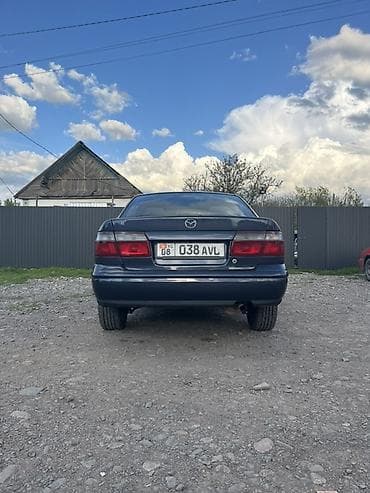 крыло rx300: Mazda 626: 1997 г., 1.8 л, Ручные, Бензин, Седан — 6