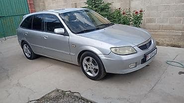 jetta volkswagen: Mazda 323: 2002 г., 1.6 л, Механика, Бензин, Хэтчбэк — 1