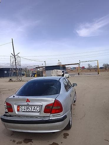 фары на опель вектра б: Mitsubishi Carisma: 1998 г., Седан — 2