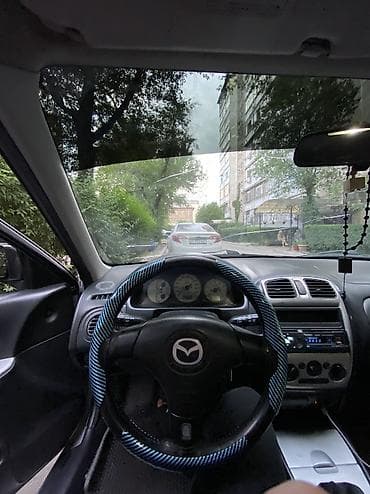 mazda 323 bj: Mazda 323: 2002 г., 1.6 л, Механика, Бензин, Хэтчбэк — 8