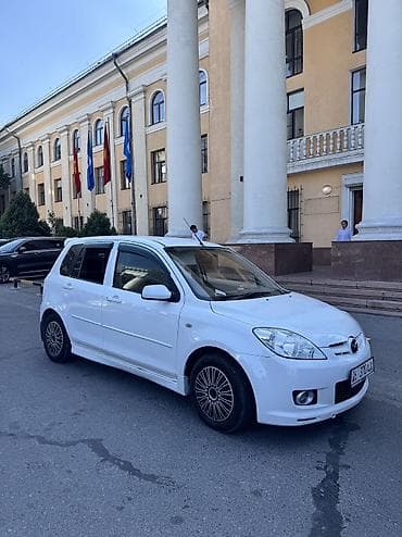Mazda Demio: 2004 г., 1.3 л, Автомат, Бензин, Седан