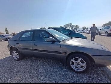 mazda protage: Mazda 323: 1993 г., 1.6 л, Ручные, Бензин, Седан — 2