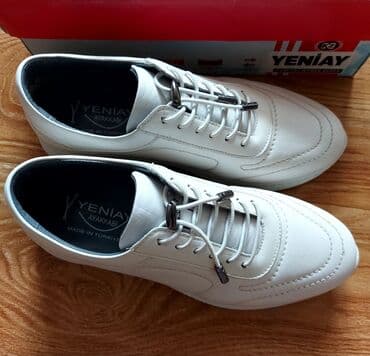 Новые кожаные кроссовки. Производство Турция. Указан на подошве 36