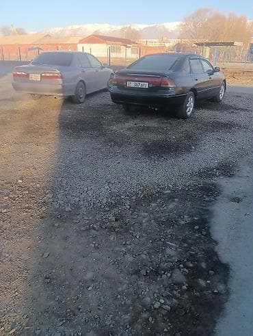 ml 163: Mazda 626: 1992 г., Седан — 4