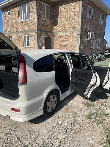 велюровое: Honda Stream: 2001 г., 2 л, Автомат, Бензин, Минивэн — 1