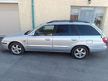 фаркоп на жх 470: Mazda 626: 2001 г., Ручные, Универсал — 3