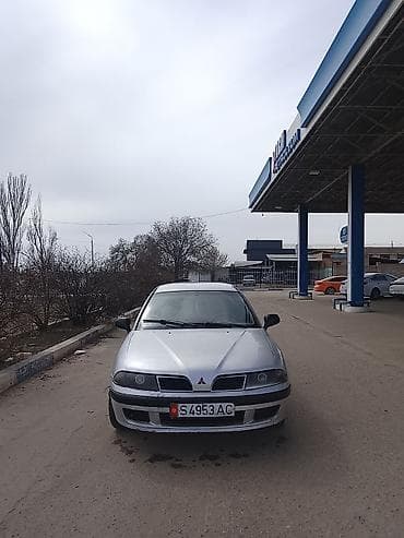 фары на опель вектра б: Mitsubishi Carisma: 1998 г., Седан — 1