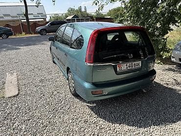 1 nz: Honda Stream: 2002 г., Механика, Универсал — 10