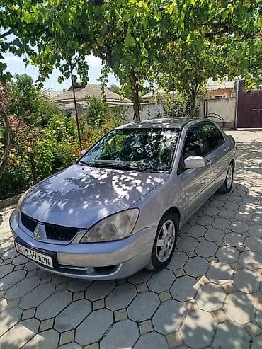 чери арризо 8 салон: Mitsubishi Lancer: 2006 г., Седан — 3
