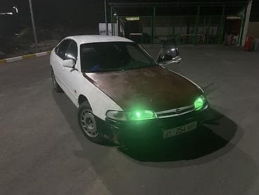 Mazda Cronos: 1991 г., 2 л, Механика, Бензин, Седан