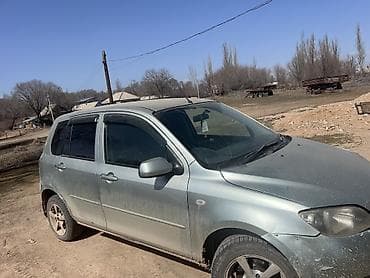 mazda familiya: Mazda Demio: 2003 г., 1.3 л, Автомат, Газ — 2