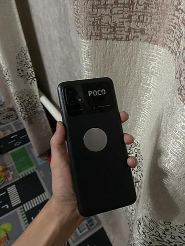 телефон кракен: Poco C40, Б/у, 64 ГБ, цвет - Черный, 2 SIM — 2