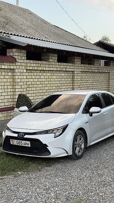sonata 2012: Toyota Corolla: 2021 г., Гибрид, Седан — 1