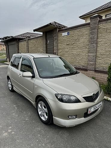 Mazda Demio: 2003 г., 1.5 л, Автомат, Бензин, Хэтчбэк