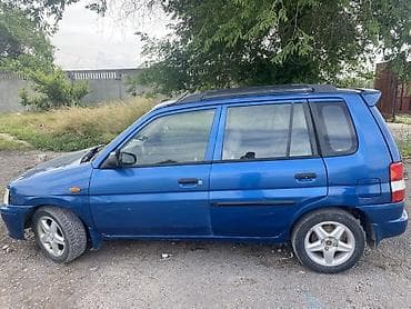 авто крепежи: Mazda Demio: 1999 г., 1.3 л, Механика, Бензин, Хэтчбэк — 4