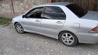 электромобиль лабо: Mitsubishi Lancer: 2002 г., Механика, Бензин, Седан — 3