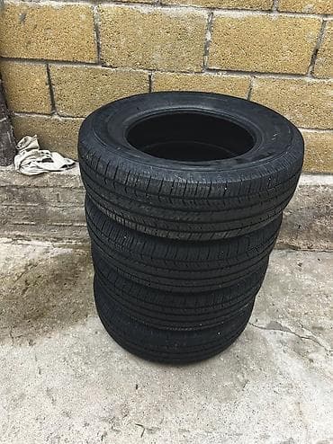 Комплект из 4 летних шин. Характеристики: - Размер: P205/70 R15 -