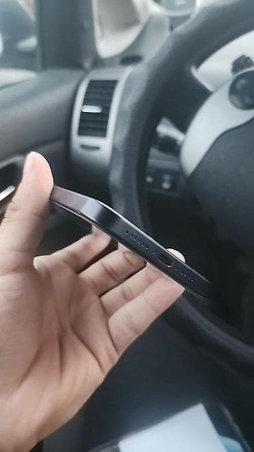 ultra wide: IPhone 15 Pro, Blue Titanium — 4