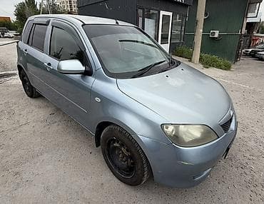 Mazda Demio: 2004 г., 1.3 л, Автомат, Бензин, Хэтчбэк