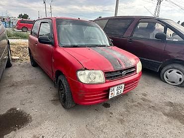 Daihatsu Cuore: 2001 г., 1 л, Механика, Бензин, Хэтчбэк — 3