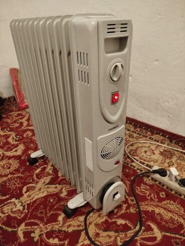 всвязи с переездом: Масляный обогреватель Кол-во секций: 10 и более, Отключение при перегреве, Отключение при падении, Встроенный вентилятор — 2
