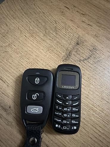 Мобильные телефоны: Мини-телефон L8STAR BM70 + Bluetooth-гарнитура 2сим и флешка — 4