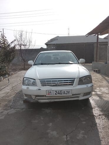 обмен авто с доплатой: Kia Clarus: 2002 г., Механика, Седан — 5