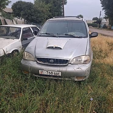 Унаа: Kia Carnival: 1998 г., 2.9 л, Кол менен иштөөчү, Дизель, Вэн/Минивэн — 6