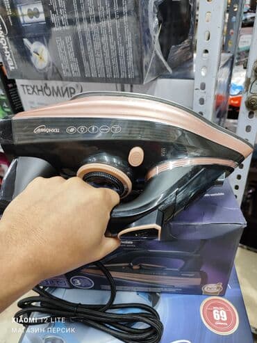 ремонт промышленных утюгов: Утюг. Техномир TH-7587 Мощность 2200Вт Резервуар для воды 400мл — 5