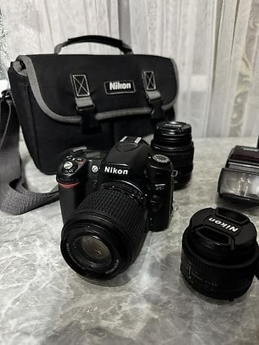 Зеркальный фотоаппарат Nikon с комплектом оптики и аксессуаров