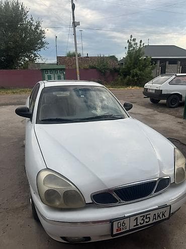golf 3: Daewoo Nubira: 2001 г., 1.6 л, Механика, Бензин — 4