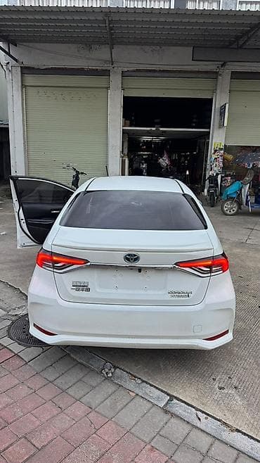 corolla 2004: Toyota Corolla: 2023 г., 1.8 л, Гибрид, Седан — 5