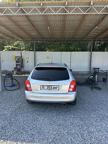 yamaha n max: Mazda 323: 2003 г., 1.6 л, Механика, Бензин, Хэтчбэк — 4