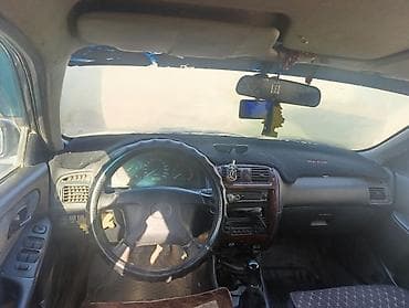 кочкор авто: Mazda 323: 1999 г., 1.8 л, Кол менен иштөөчү, Бензин, Седан — 3