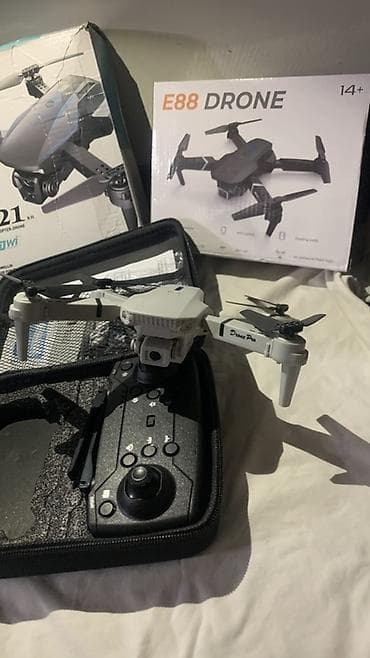 ufc диск: Квадрокоптер E88 DRONE (14+) - Складная конструкция: компактные лучи — 5