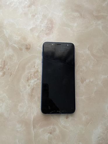 iphone ce: Смартфон Samsung (серия J, корпус синего цвета). Основные — 2