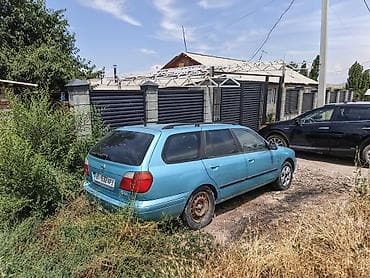 мереке авто: Nissan Primera: 1999 г., Кол менен иштөөчү, Универсал — 2